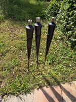 Fackeln für die Gartenparty. Für Petroliumflaschen