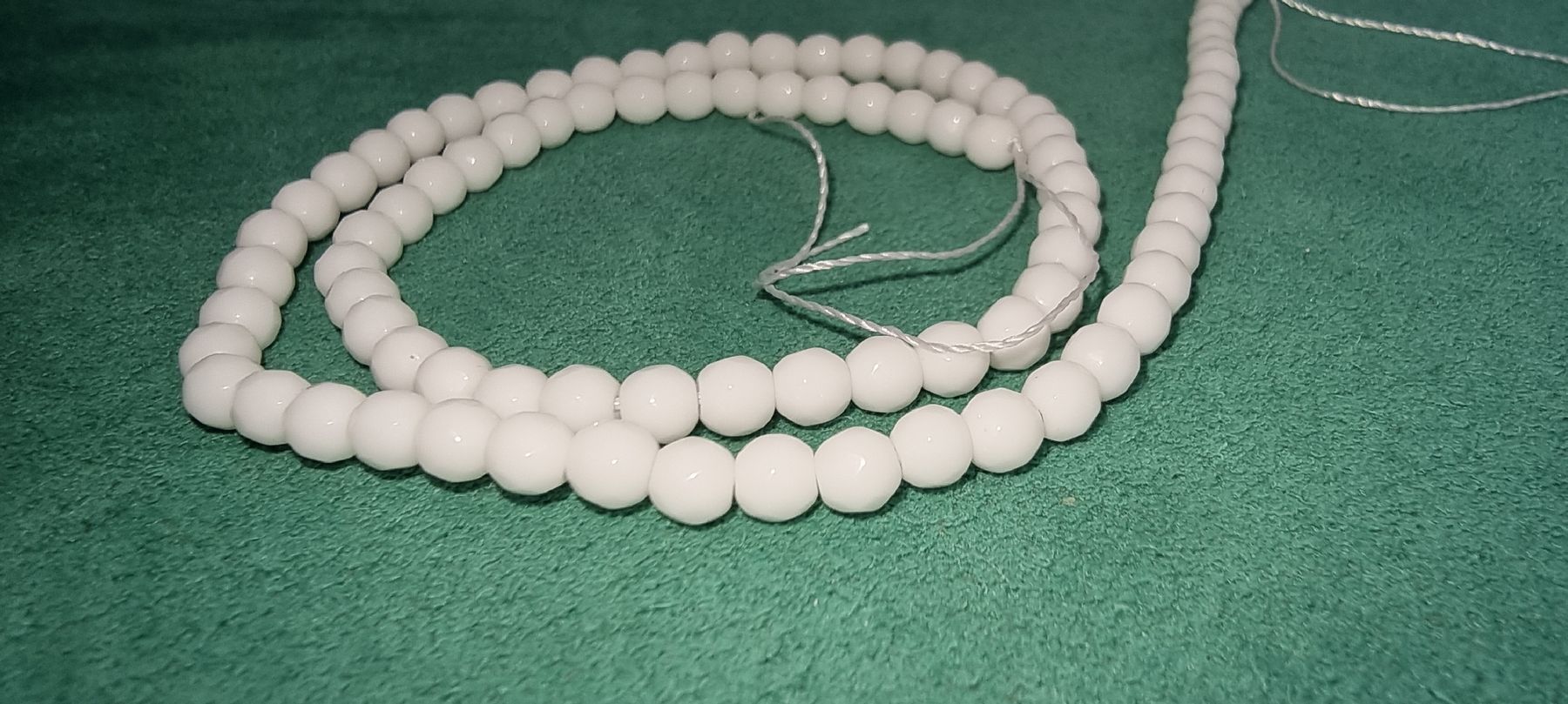 Minerali & Pietre curative: Onyx weiss 4mm. facettiert Strang – Nuovo e nell'imballaggio originale da Menziken venduto da Mirager