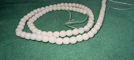 Onyx weiss 4mm. facettiert Strang