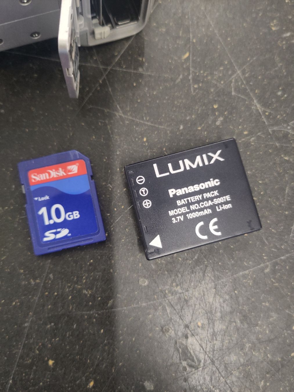 Panasonic Kamera: Panasonic Lumix DMC-TZ1  – Defekt aus Pratteln von Cartonsducoeur_bl 4
