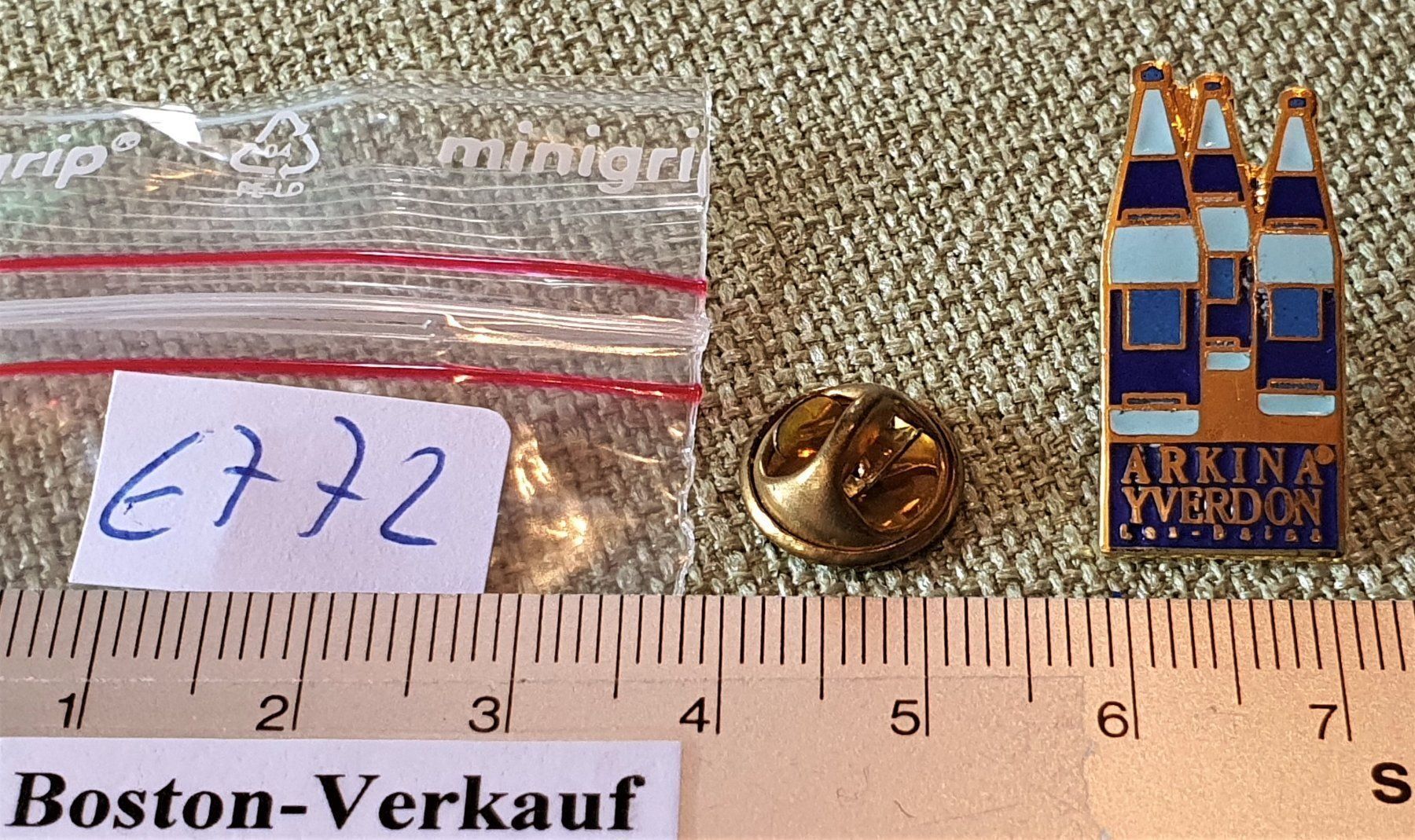 Placchette & Badge: E772 - Pin Mondo - Arkina Yverdon – Usato da Reinach BL venduto da Boston-Verkauf 2