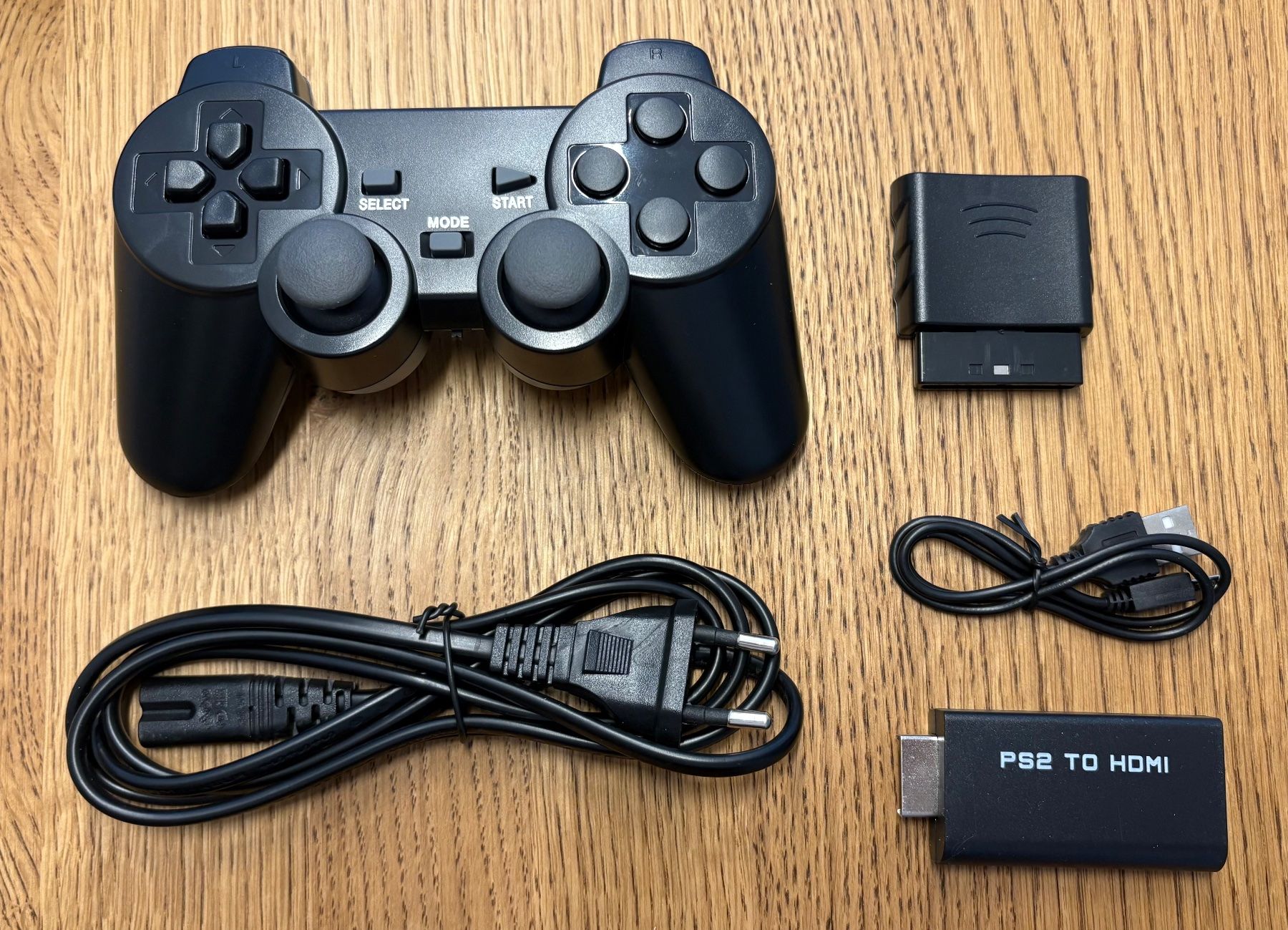 Sony Console: PlayStation 2 Set inkl. Controller, HDMI-Adapter & Spiele – Usato da Niederrohrdorf venduto da Olykesh 2