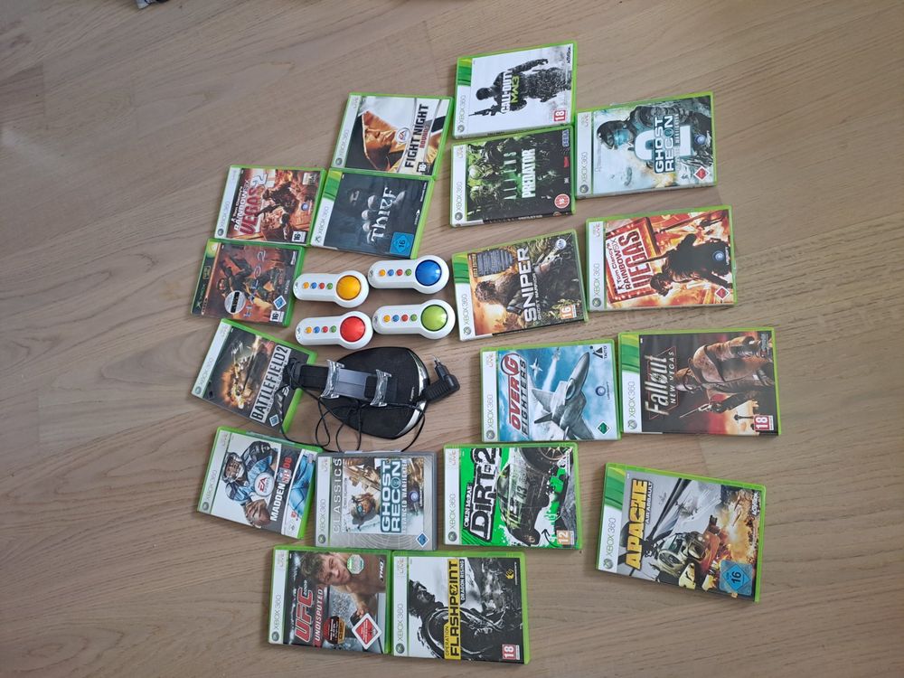 Controller und Aufladestation und 18 Spiele für die Xbox 360 Kaufen auf Ricardo