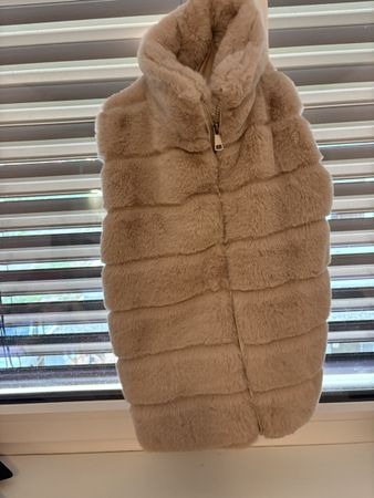 Gilet sans manches fausse fourrure beige bon etat