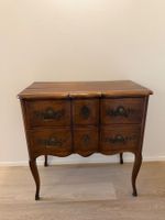 Commode arbalete