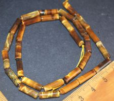 Stein Perlen Strang L-4948 – Tigerauge 4x13mm Zylinder 29 St