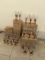 Diverse neue Rot- Weiss- Champagner Gläser aus Geschäftsaufl