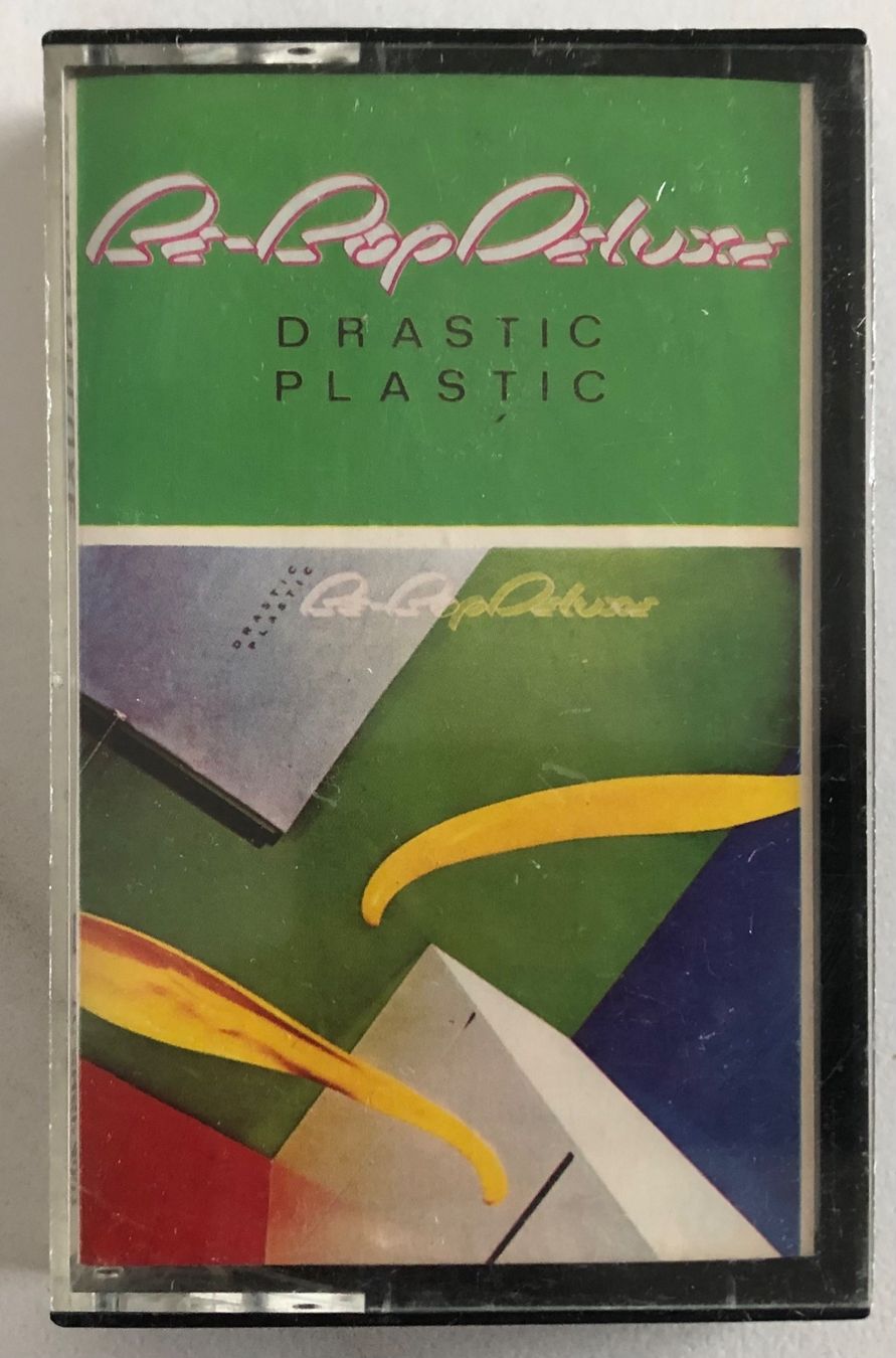 Musicassette: BE-BOP DELUXE - DRASTIC PLASTIC – Usato da Poliez-Pittet venduto da Newtown-Records