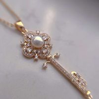 Collier Clé Élégance