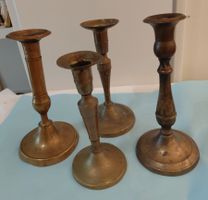 4 antike Messing-Kerzenständer