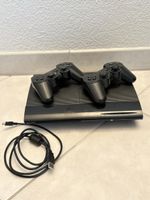 Sony PlayStation 3 Konsole mit zwei Controllern schwarz