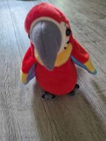 Sprechender Plüschpapagei