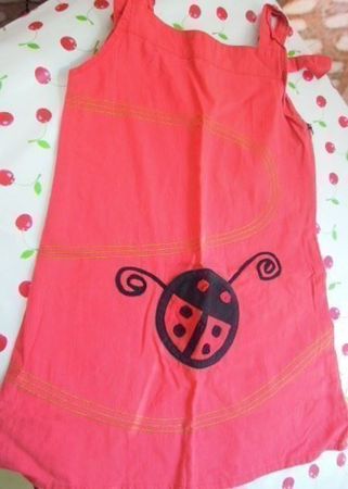 Gr. 128 Tunika evt Kleid koralle (etwas matt) Marienkäfer