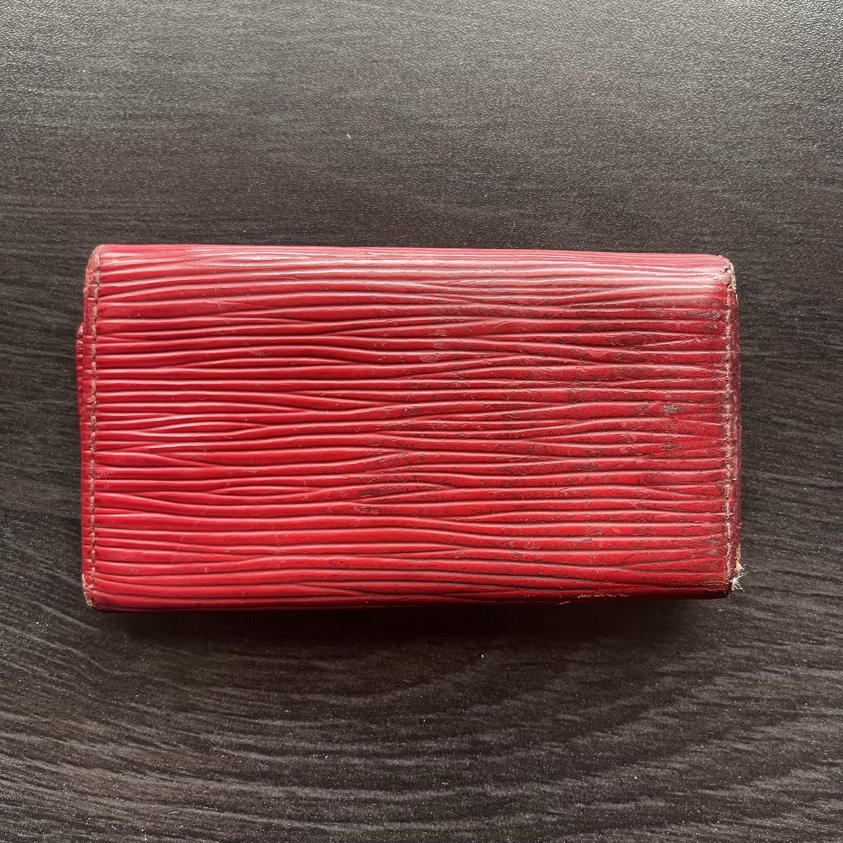 Louis Vuitton Portafogli: Vintage Louis Vuitton red key holder – Usato da Genève venduto da FoundTears 2