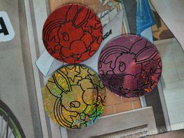 Three Eevee Coins Prismatic Evolutions PRE