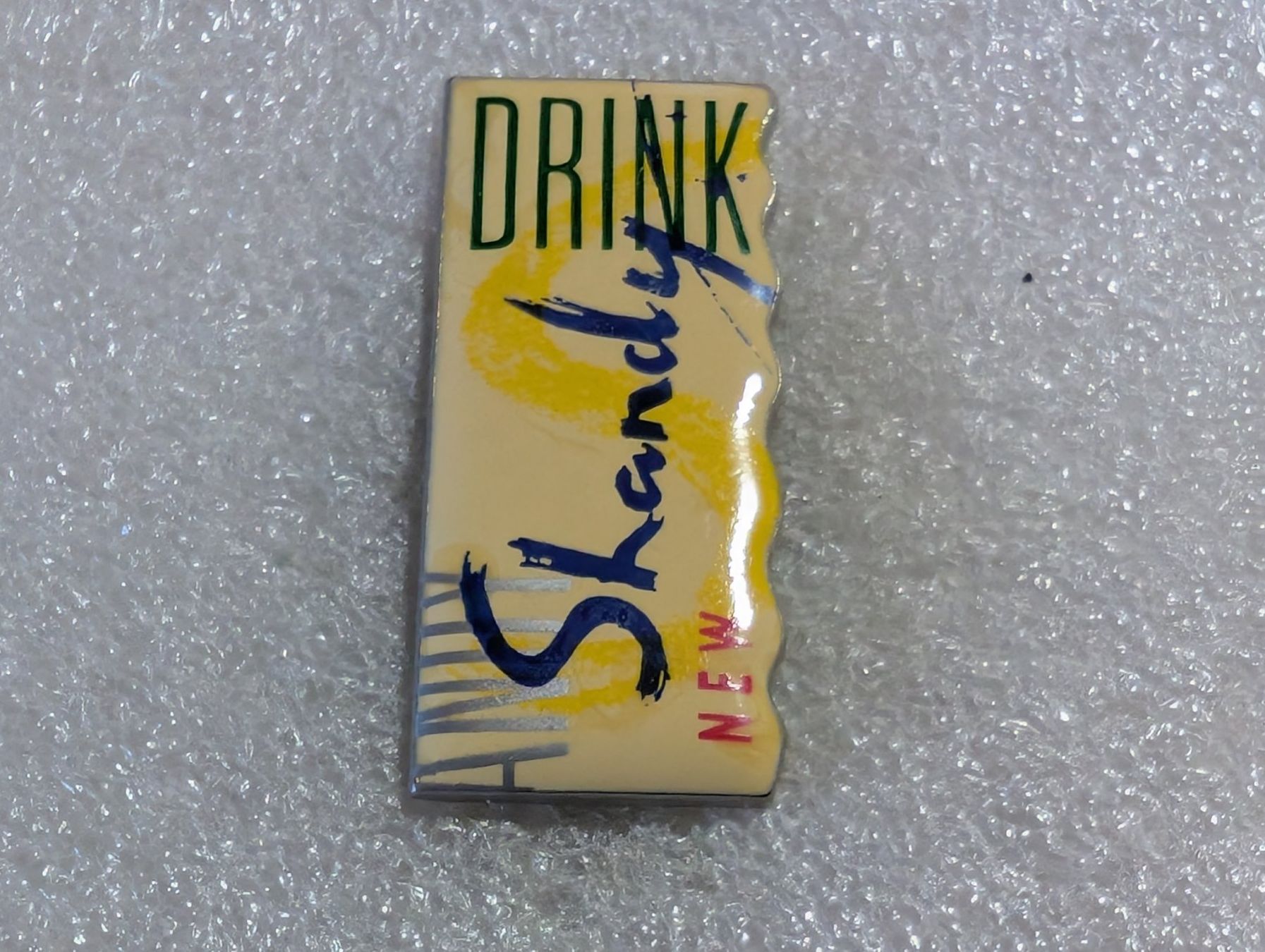 Placchette & Badge: Ansteckpin 127: Shandy – Usato da Oppligen venduto da Pin-Fall-Shop