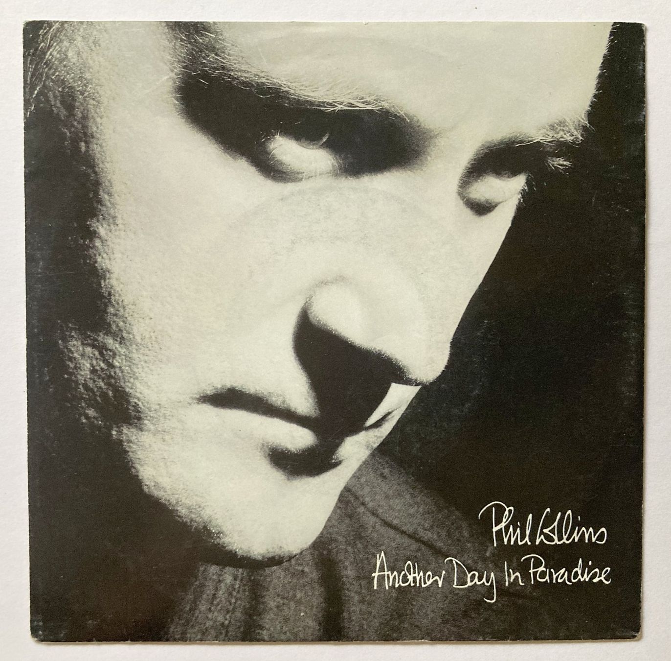 Schallplatten: PHIL COLLINS - ANOTHER DAY IN PARADISE – Gebraucht aus Bottens von hotter-than-hell