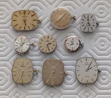 Omega Uhrwerke Handaufzug, 9 Stück;