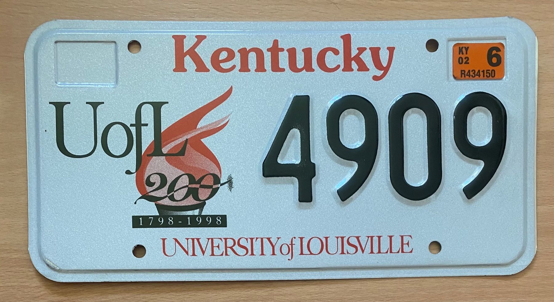 Insegne: Kentucky Nummernschild 4909 UofL, 2002 – Usato da Wolfhalden venduto da 19651979