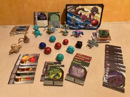 Lot de billes Bakugan, cartes et pochette
