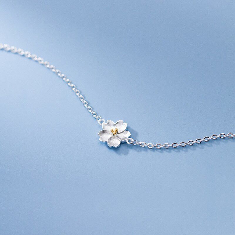 Bracciali & Braccialetti: Blumen Armband aus Silber – Nuovo e nell'imballaggio originale da Wil SG venduto da Veratier 1