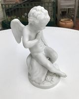 Statuette de Cupidon selon Falconnet en biscuit