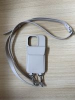 Handykette von Urbany’s beige iPhone 14 Pro neuwertig