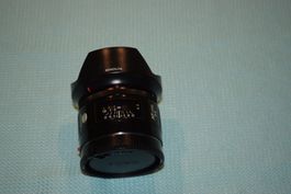 Minolta 24mm 1:2.8 mit Sonnenblende