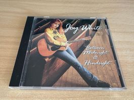 M1 Joy White – Between Midnight & Hindsight