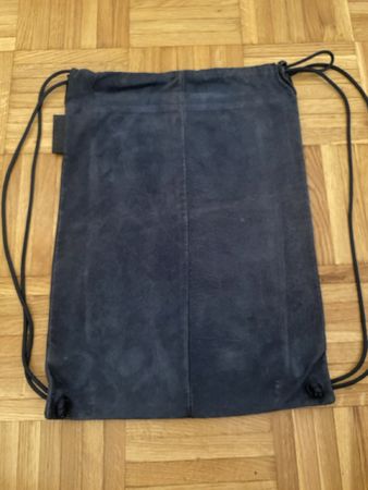 Sac à cordons bleu cuir suédé bon état