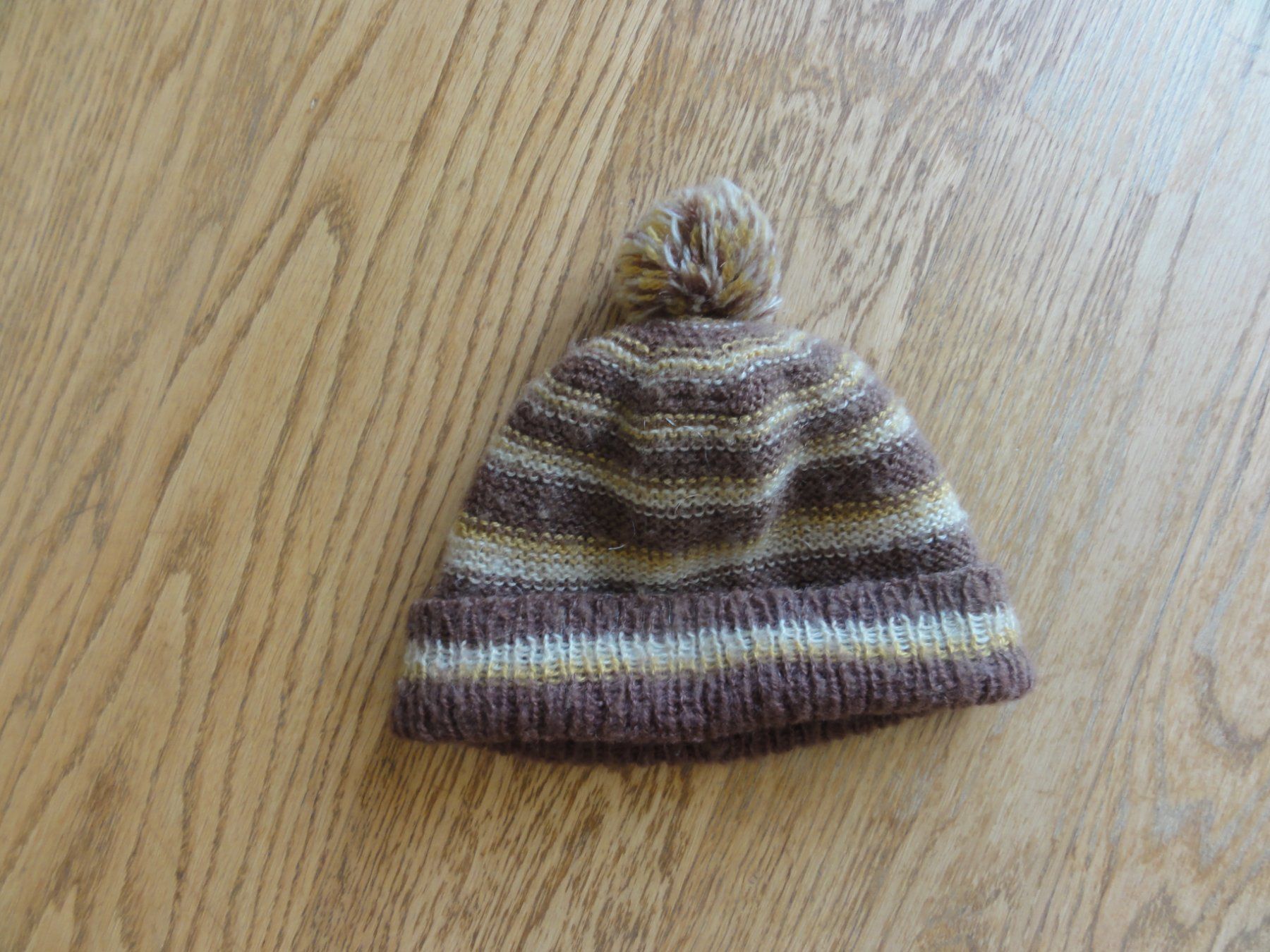Altro abbigliamento per bambino: Wollmütze selbstgestrickt – Usato da Riedholz venduto da Taweva