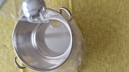 Silbertopf mit Schöfpkelle