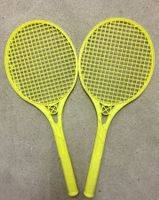 2 leuchtgelbe Beach-Tennisschläger
