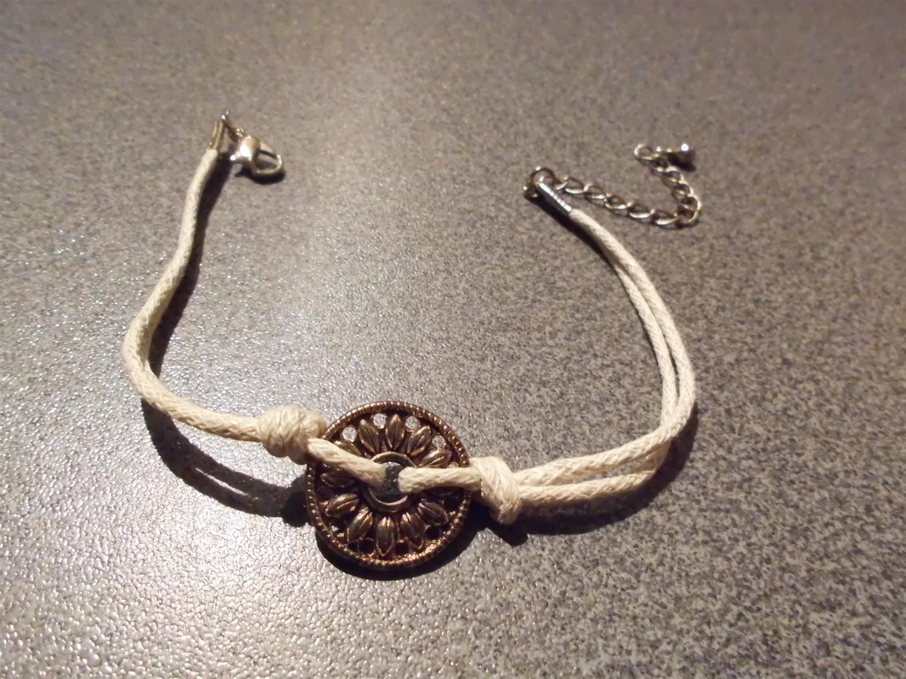 Bracciali & Braccialetti: Armband Schnur mit einer Scheibe – Usato da Zürich venduto da abraxas1291