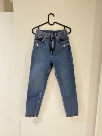 Jeans bleu clair troué - Taille 38 - Parfait pour l'été!