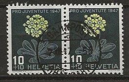 1947 JUVENTUE 10 Rp. im Paar FEUERLILIE, gestempelt