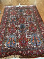 2Tapis oriental fait main, rouge et bleu, en parfait état.