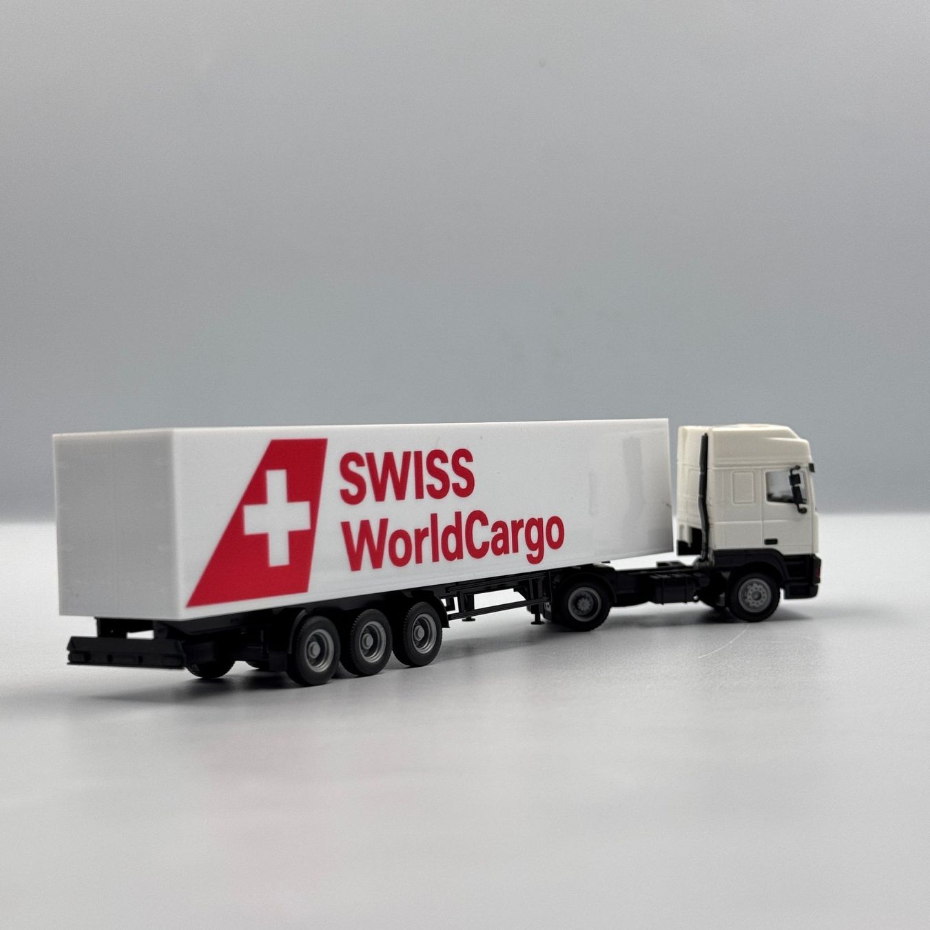 Daf Modellini d'auto: DAF Swiss World Cargo 1/87 HO – Nuovo e nell'imballaggio originale da Hochfelden venduto da aviatikboerse_top 1