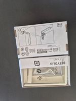 vier Wandbefestigungen für Gardinenstangen von IKEA