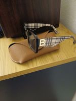 BURBERRY lunettes de soleil motif checkered étui cuir