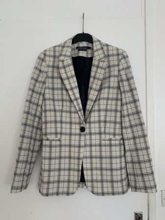 Blazer blanc à carreaux bleu marine