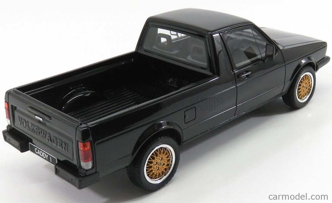 Volkswagen Modellautos: VW GOLF CADDY BLACK MIT SURFBOARD 1:18 OTTO – Neu und originalverpackt aus Suhr von Moebelsiralfred 3