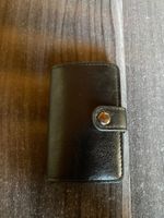 Porte-cartes et porte-monnaies couleur noir