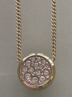 Collier Guess doré avec des cristaux Swarovski