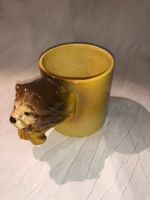 Tasse mit Löwenkopf H=9 cm, D=8,5 cm
