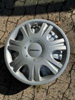 4 enjoliveurs Subaru 15 pouces d’origine