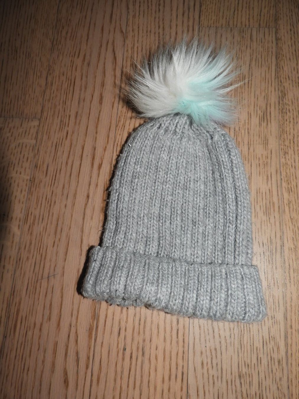 C&A Autres vêtements fille: Strickmütze mit Bommel grau – D'occasion à Hergiswil NW par Noema2006