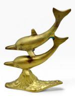 Sculpture de dauphins en laiton doré