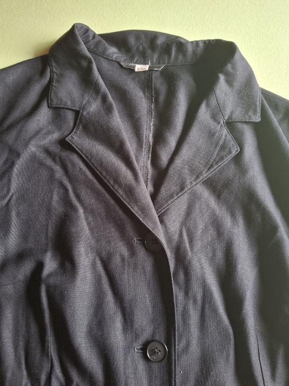 Veste courte sans manches caoutchouc beige bordures fausse