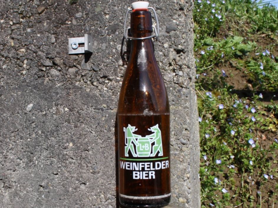 Bicchieri, Caraffe & Bottiglie: BIERFLASCHE WEINFELDER BIER L+B BÜGELFLASCHE – Usato da Wauwil venduto da Pneuedy